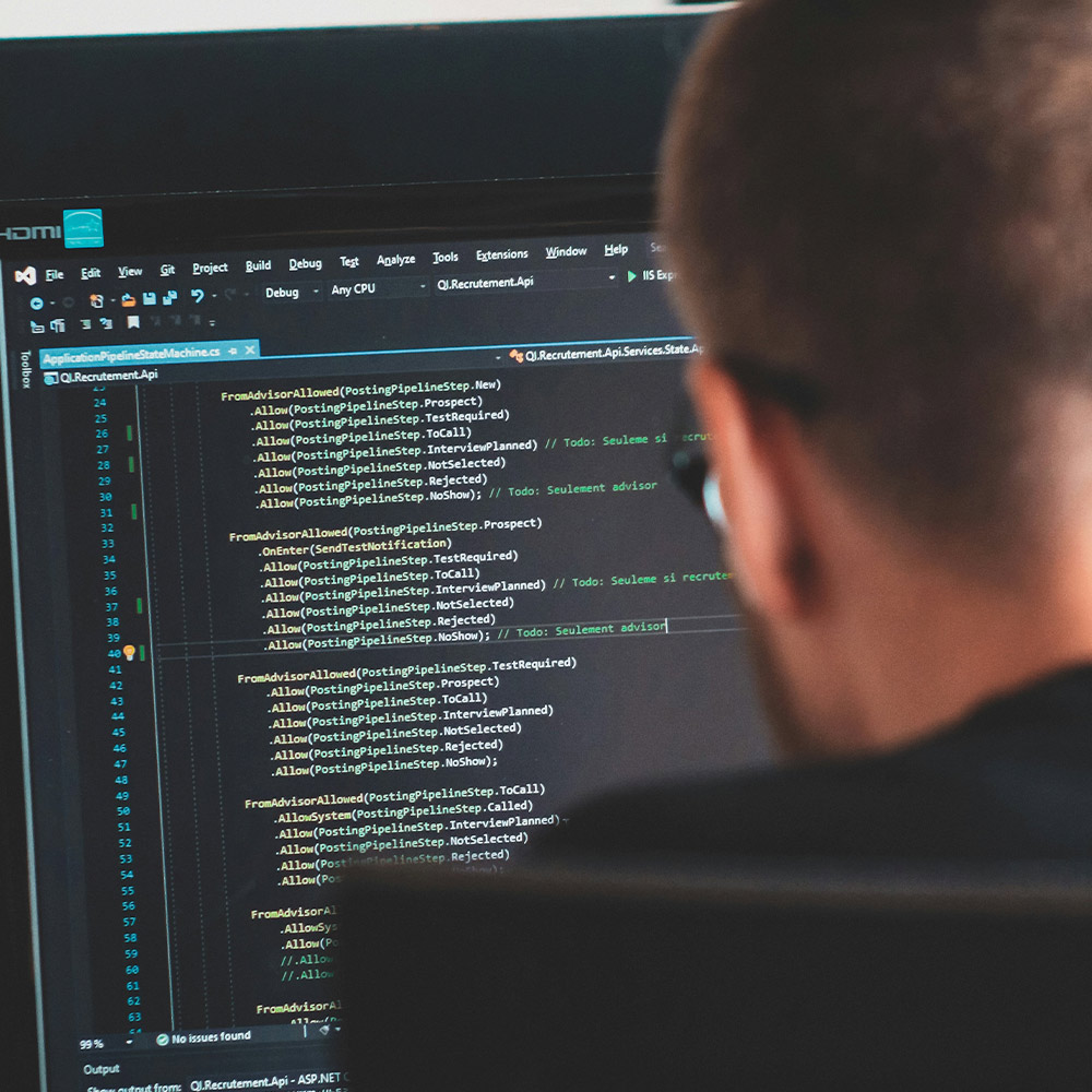 Automation engineer in front of screen